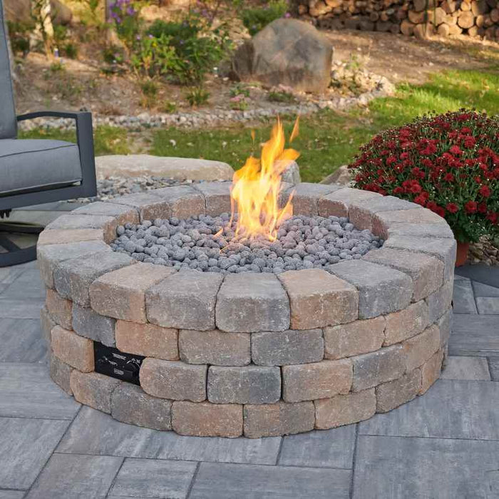 Bronson Block Round Gas Fire Pit Kit Placed at Frontyard with Tumbled Lava Rock Scaled plus Fire Burner On Scaled