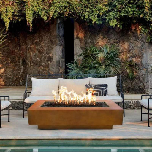 Cedar Park Fire Pit - Corten Steel  48" Placed in Poolside Lounge Area with Lava Rock V2