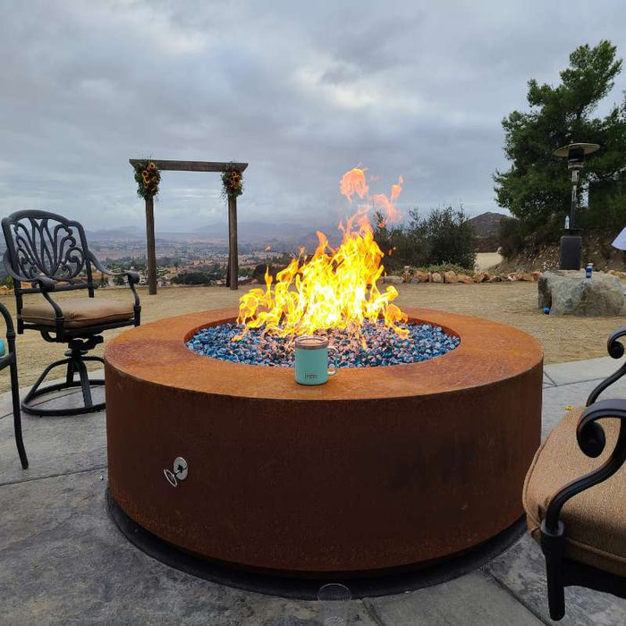 Corten Steel Unity with Cerulean Fire Pebbles place at the center of a Event Place V1