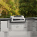 Fire Magic EL500 Electric Grill Placed in Backyard Garden Area with Contemporary White Aspen Outdoor Kitchen Island V2