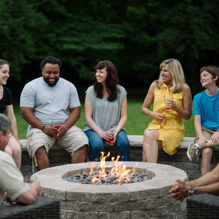 HPC Fire Round Bowl Fire Pit Burner Insert in Landscaped Lawn Side with Rolled Lava Rock