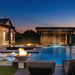 Malibu Fire Bowl - Powder Coated Metal Gray place at the Poolside with Lava Rock plus Bullet Fire Buner On