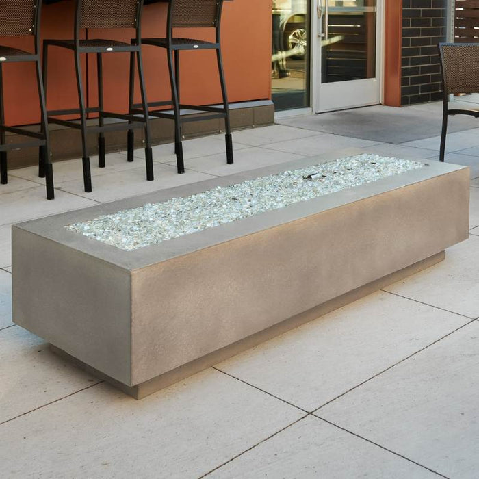 Natural Grey Cove 72 Linear Gas Fire Pit Table at the Front Yard with Clear Tempered Fire Glass Gems