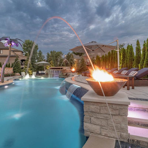 Reno Fire Bowl - Hammered Copper  31 Placed in Poolside with  Lava Rock