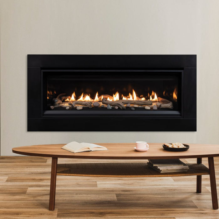 Superior 55" Direct Vent Linear Gas Fireplace DRL3555 closeup with black matte surround driftwood log set and riverrocks