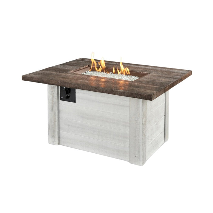 The Outdoor Greatroom Alcott Rectangular Gas Fire Pit Table with Clear Tempered Fire Glass Gems Fire on