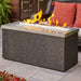 The Outdoor Greatroom Stainless Steel Key Largo Linear Gas Fire Pit Table Placed at the Deck with Clear Tempered Fire Glass Gems plus Fire Burner On Scaled