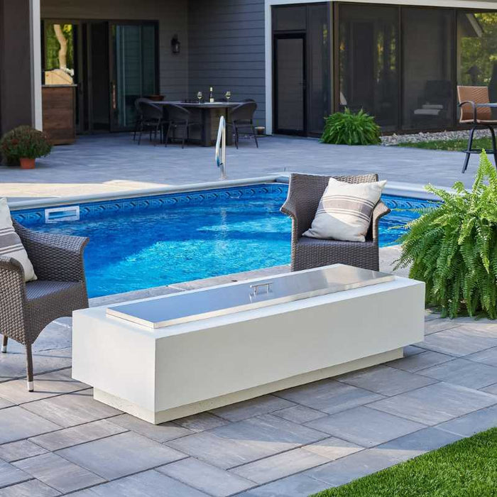 White Cove 72 Linear Gas Fire Pit Table Installed at Poolside with Stainless Steel Burner Cover